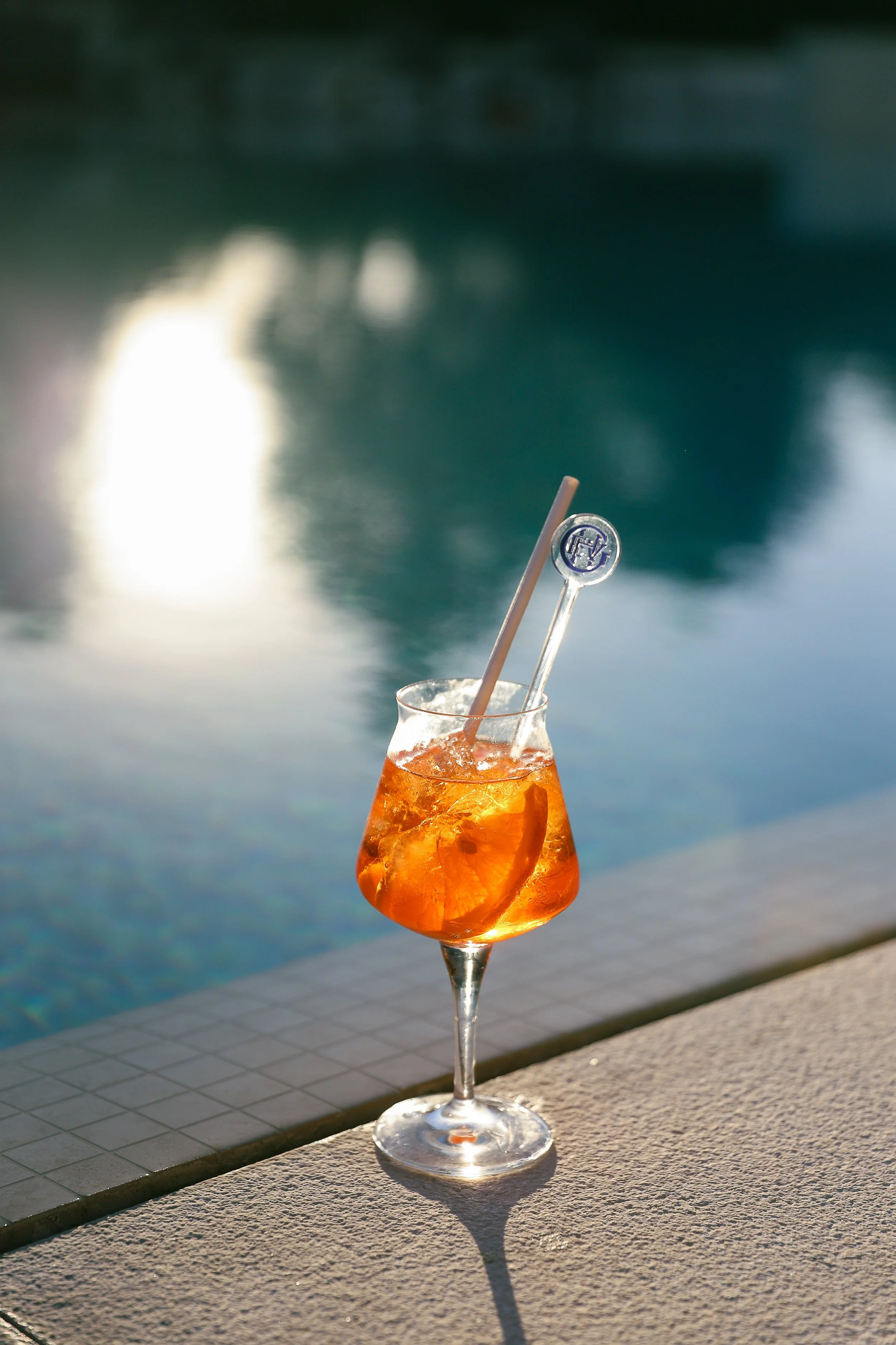 Hospitality photographer for Excelsior Vittoria luxury Hotel in Sorrento photographing the swimming pool at the hotel along with the cocktails 