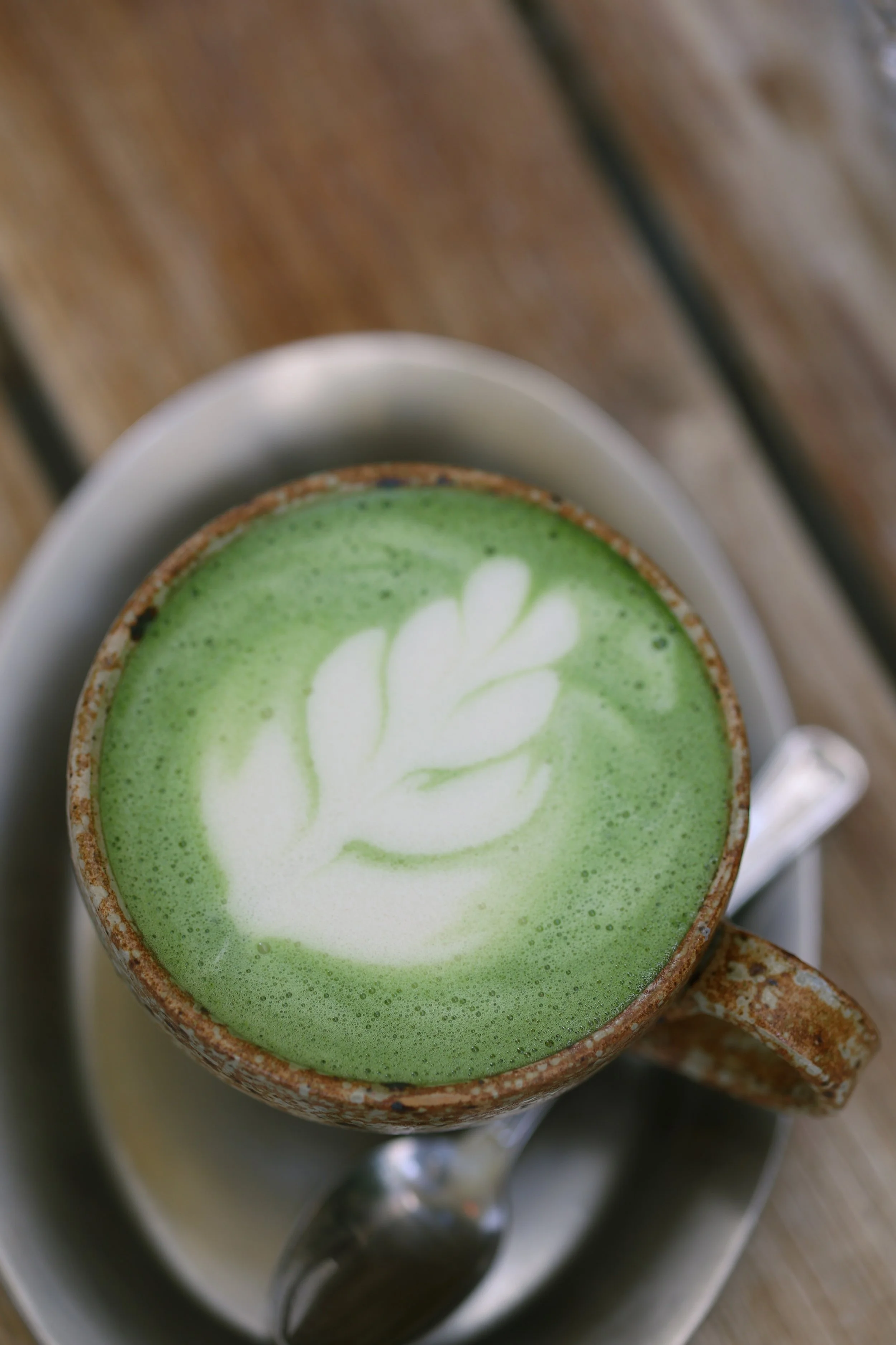 Food photography for Filiera coffee shop in Lecce, photographing granola bowl, croissant, matcha latte, and specialty coffee