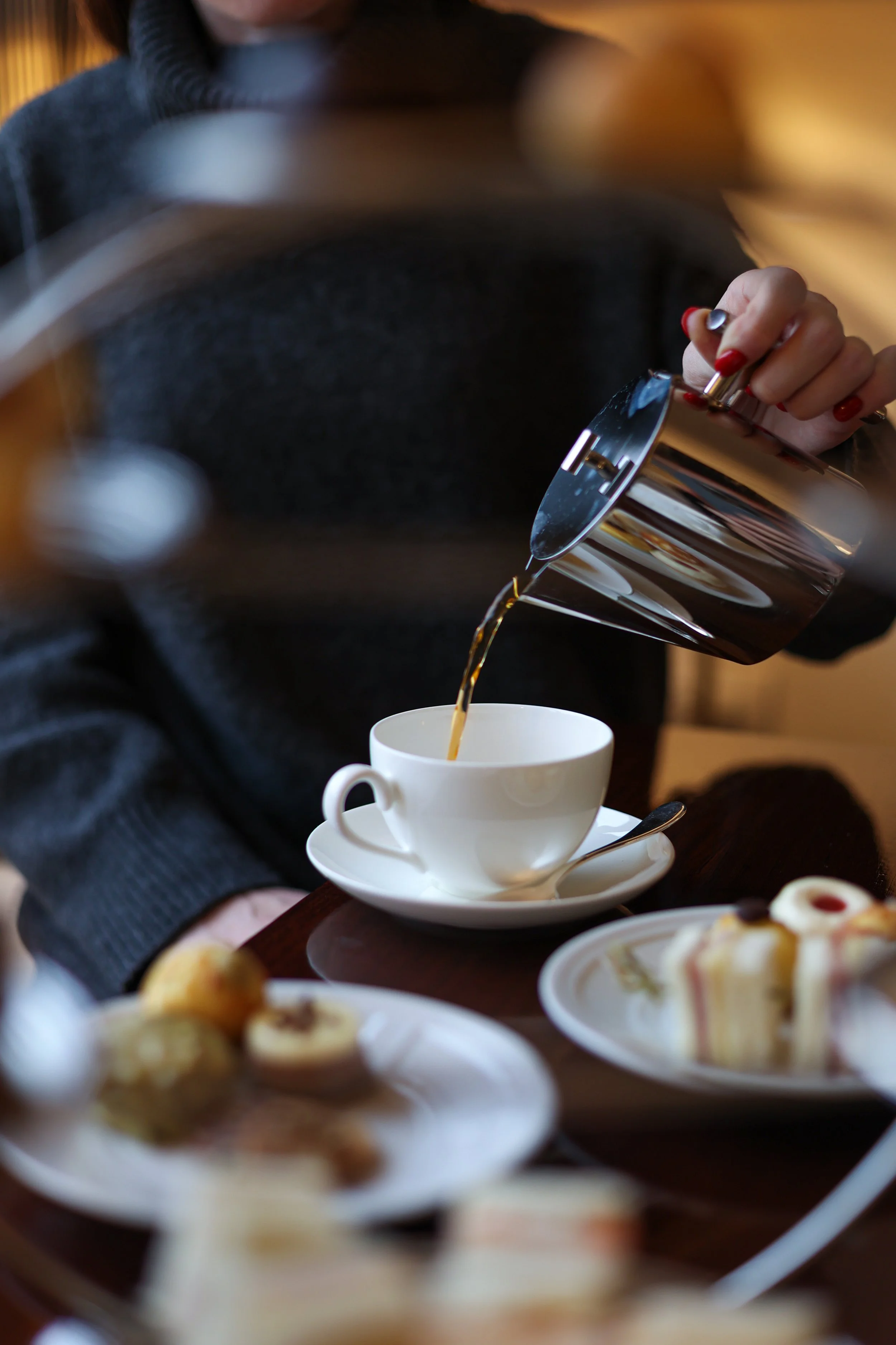 Hospitality photographer at Lungarno Luxury Hotel in Florence, photographing the English tea time, tea and cakes