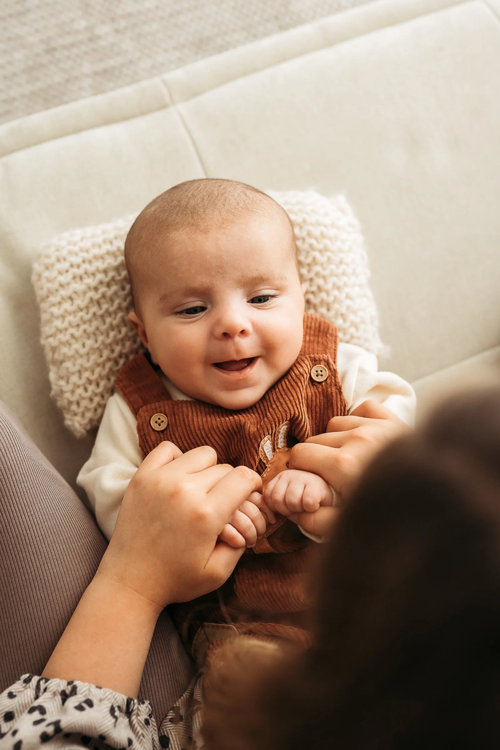 A sweet baby moment capturing their little personality, expressions and the details parents never want to forget.