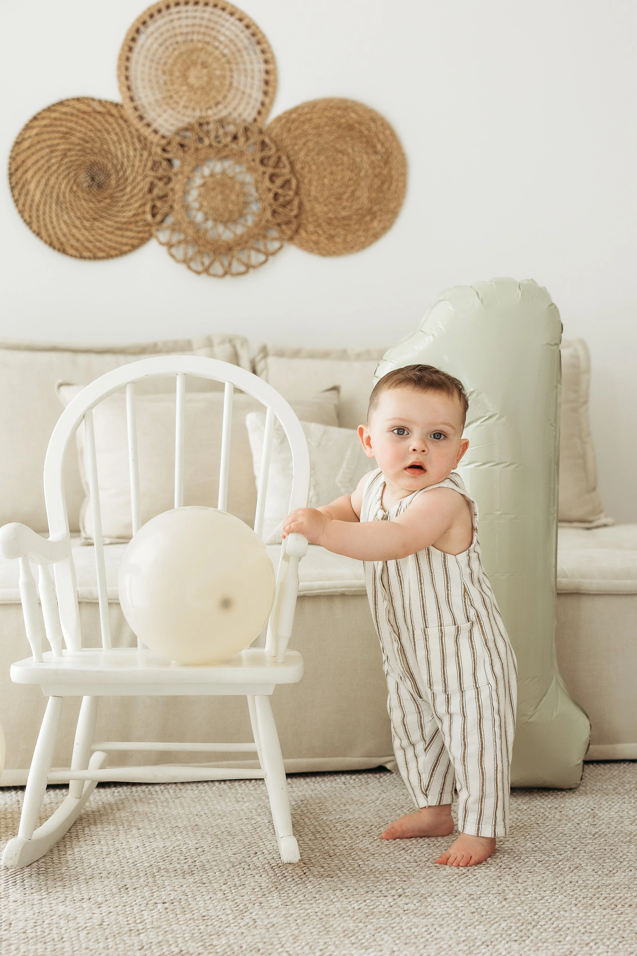 A sweet first birthday portrait capturing a little one’s personality and the excitement of reaching this special milestone.