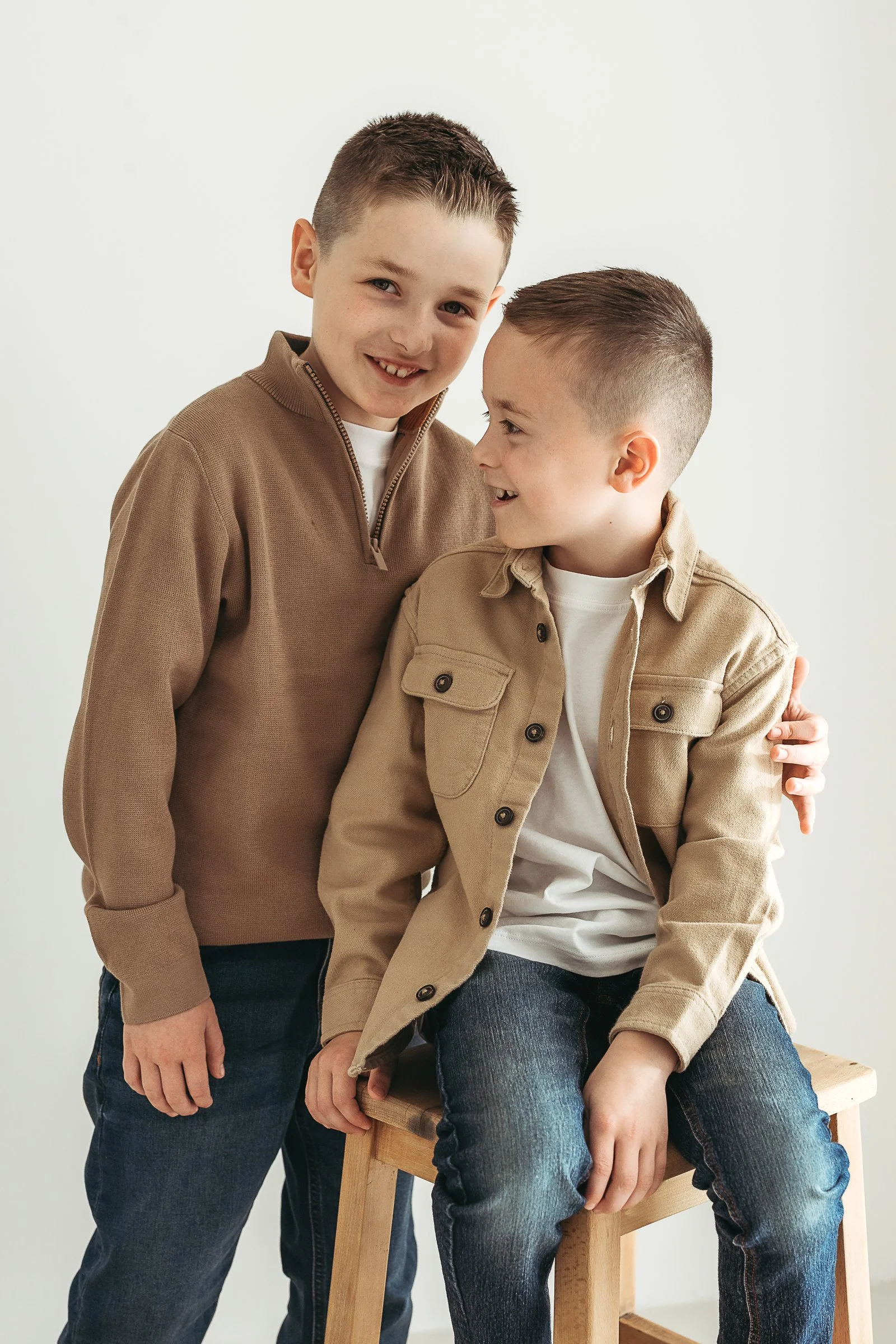 Two brothers sharing a quiet moment together, capturing their bond, personalities and the connection between them.