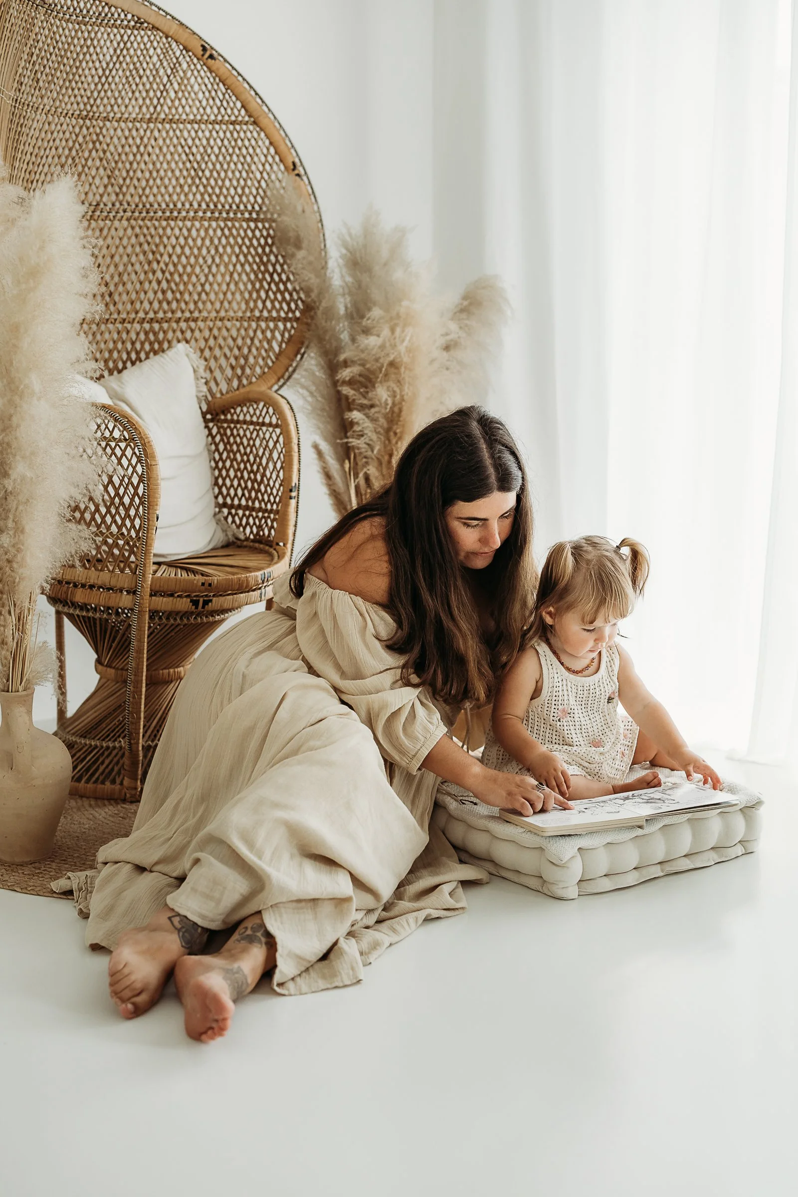A mother and daughter sharing a quiet moment together, capturing the love, connection and little rituals that make childhood special.