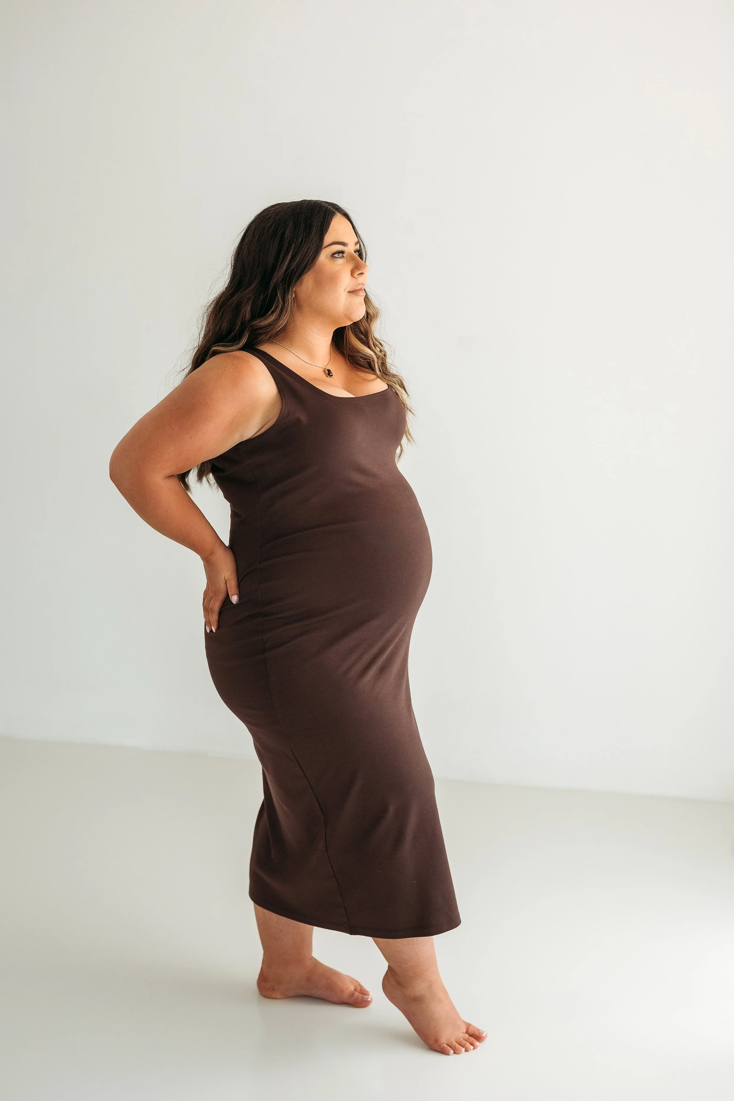 An elegant maternity portrait celebrating the beauty and confidence of motherhood during pregnancy.