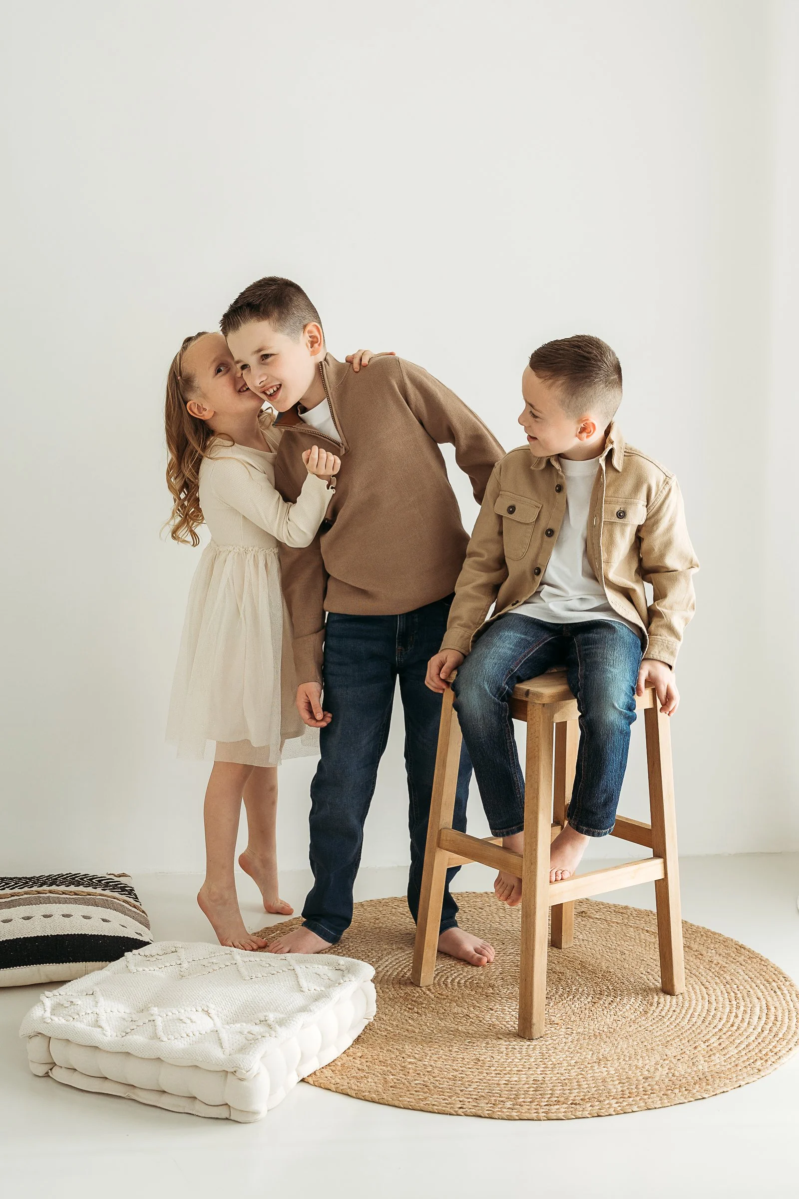 Siblings sharing a playful moment together, capturing their personalities, connection and the little interactions that make childhood special.