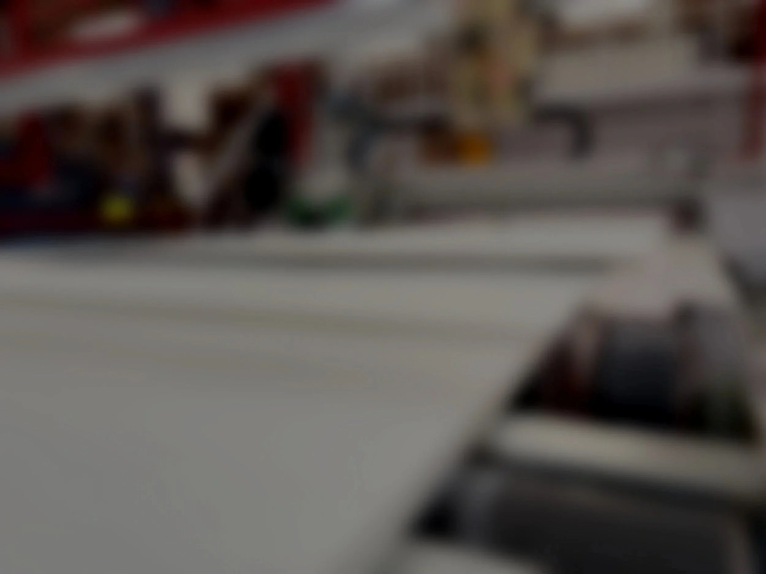 Blurred image of one of Yorkshire Plywood's laminating lines.