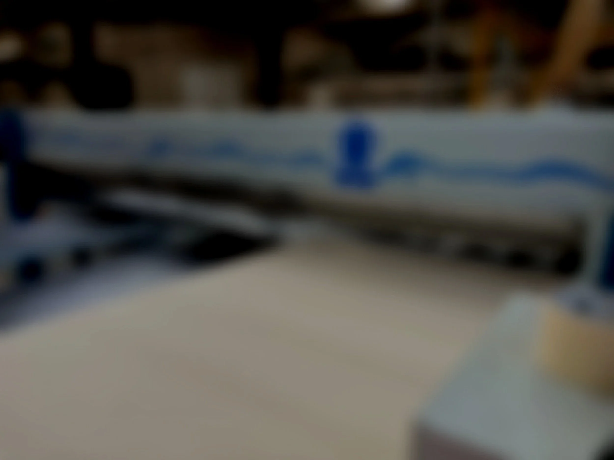 Blurred close-up one of Yorkshire Plywood's beam saws.