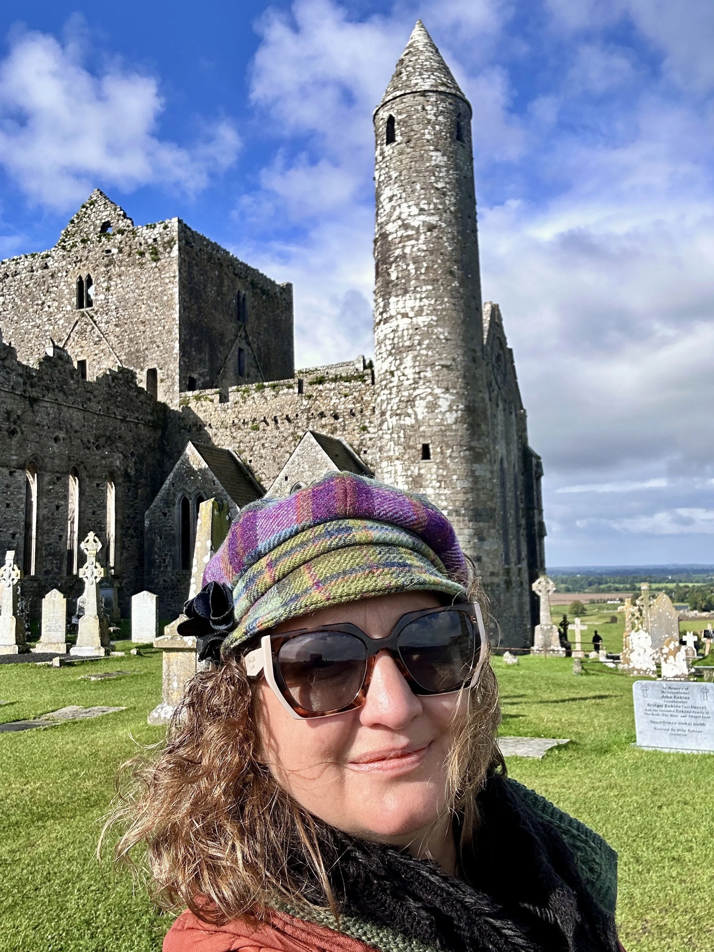 Rock of Cashel in Ireland, woman visiting ancestral lands. 