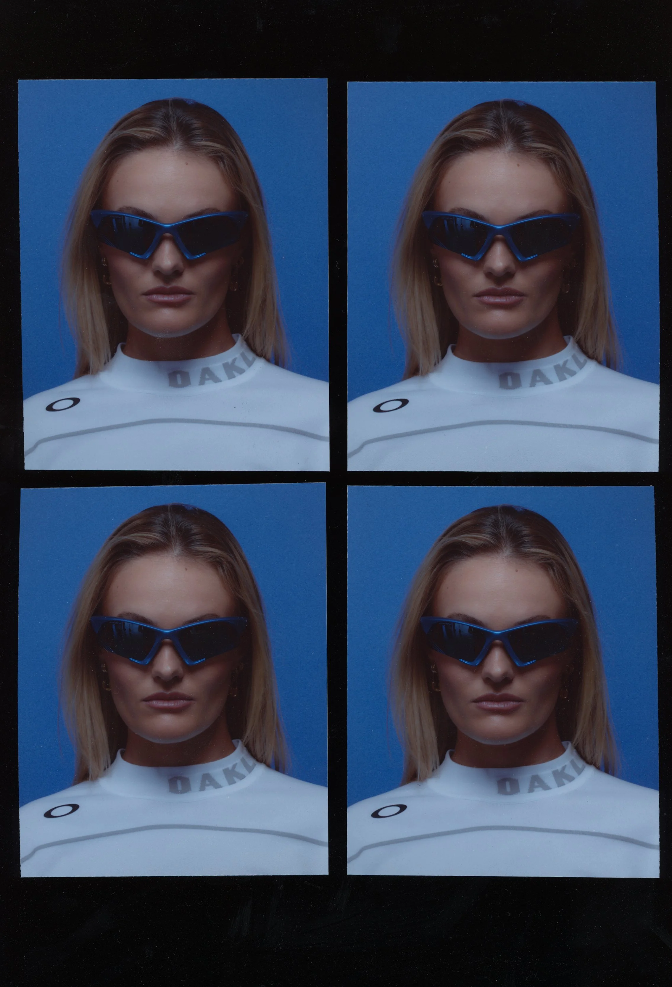 Photograph of four identical portrait photos of a woman with blonde hair, wearing dark sunglasses and a white sports shirt, set against a blue background.