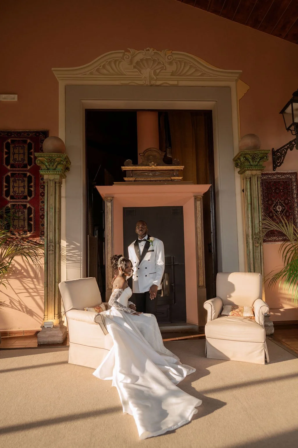 Bride and groom posing inside an elegant Italian wedding venue by the name of Fattoria Antica di Paterno Montespertoli  in Tuscany