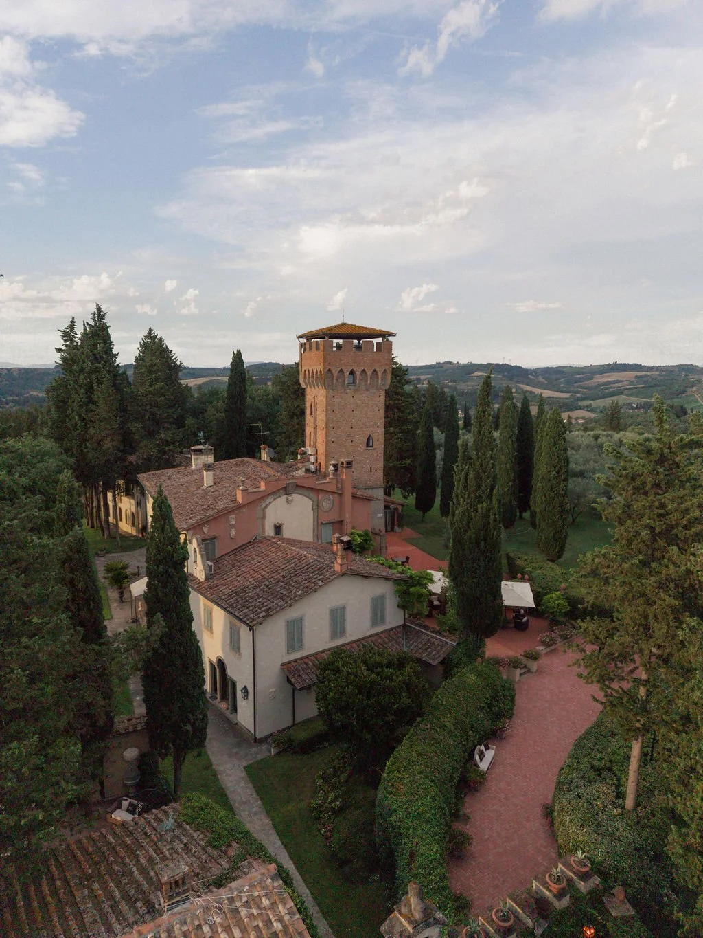 Aerial view of a historic Italian wedding estate in the chianti hills in tuscany
