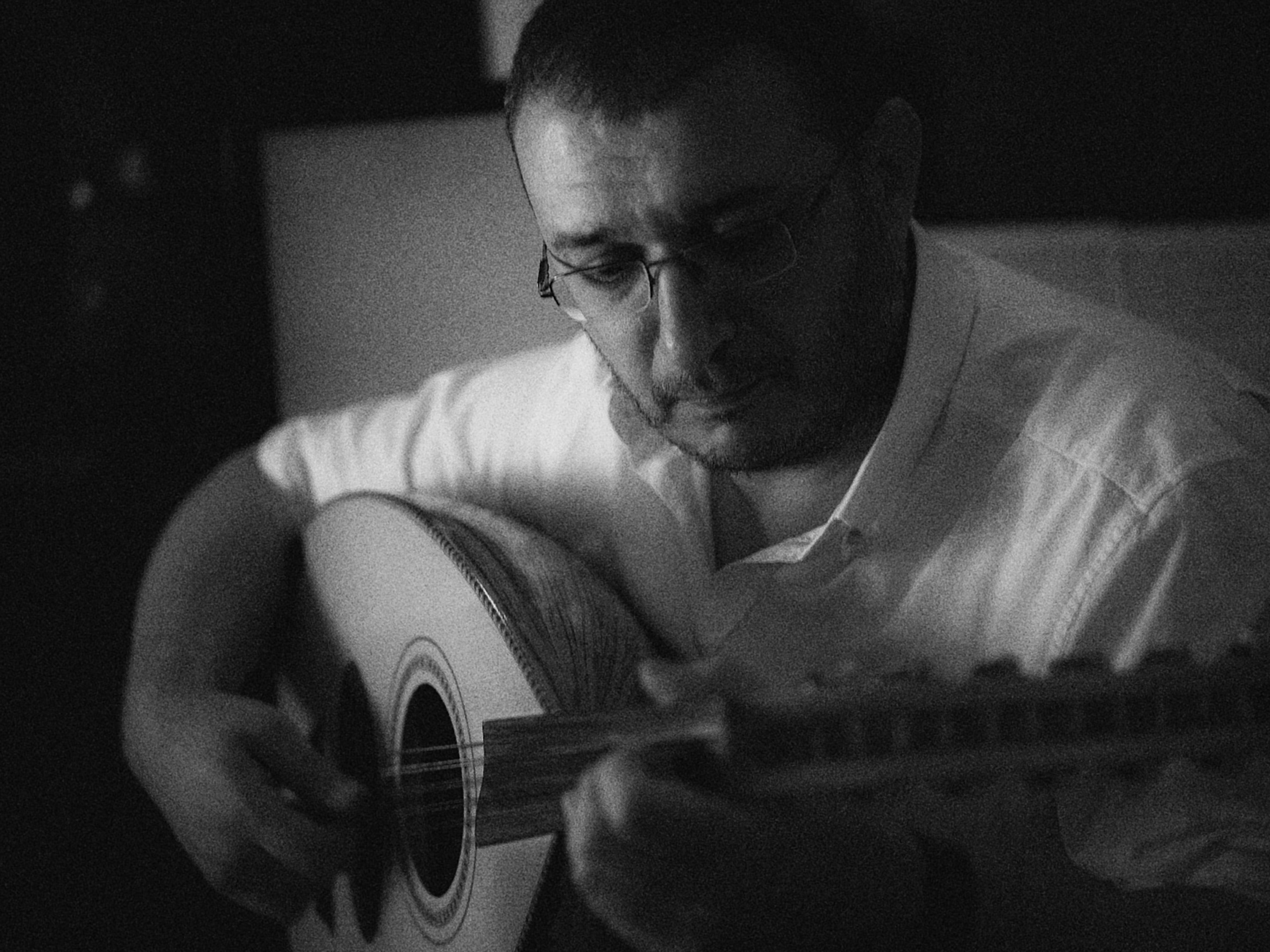 Emile Aouad playing oud.