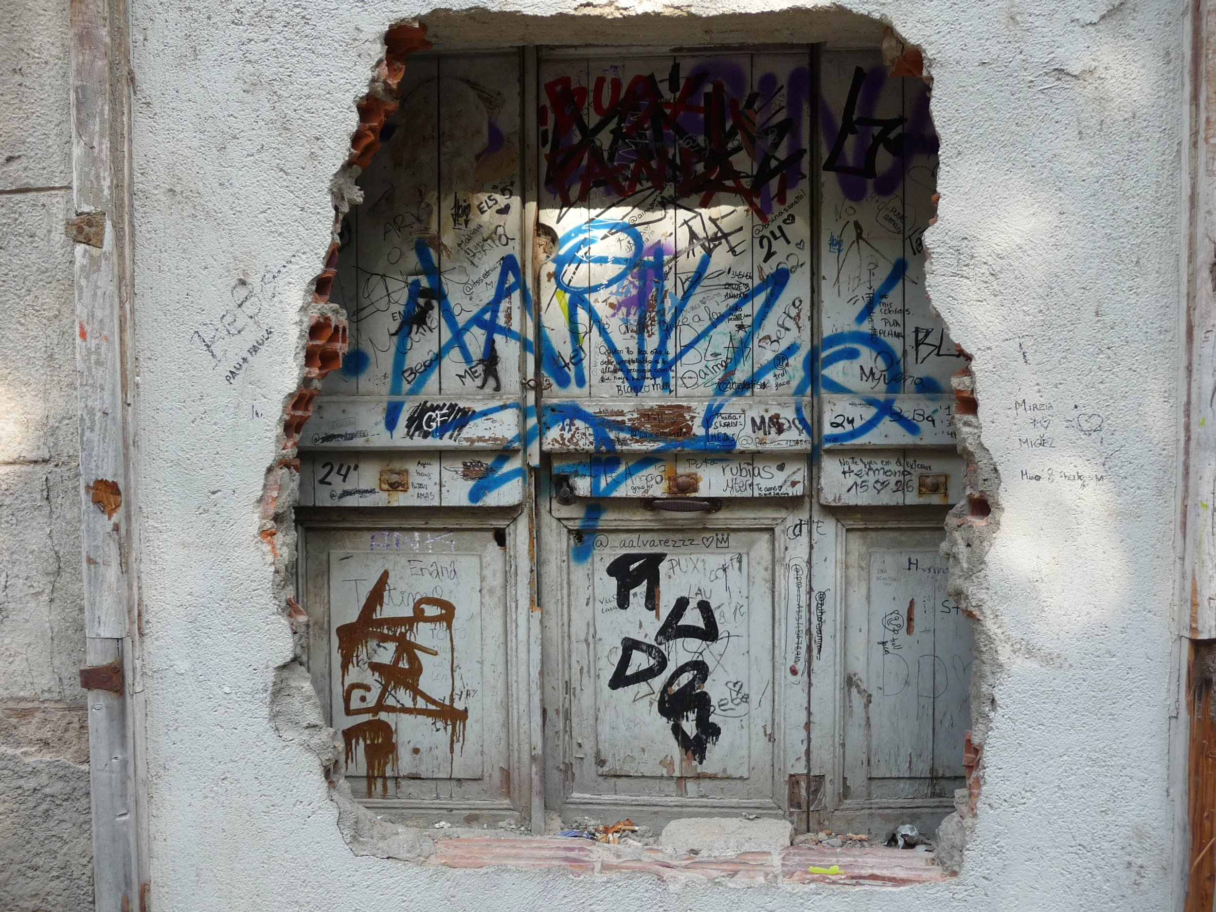 graffiti on a door in Girona, Spain