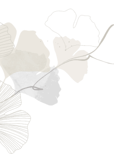 Abstract arrangement of various textured and colored leaves on a black background.