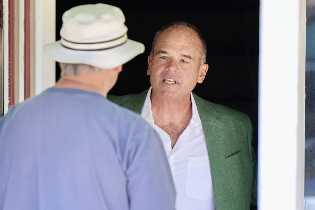 Dan Druker talking with a Woodside California Resident