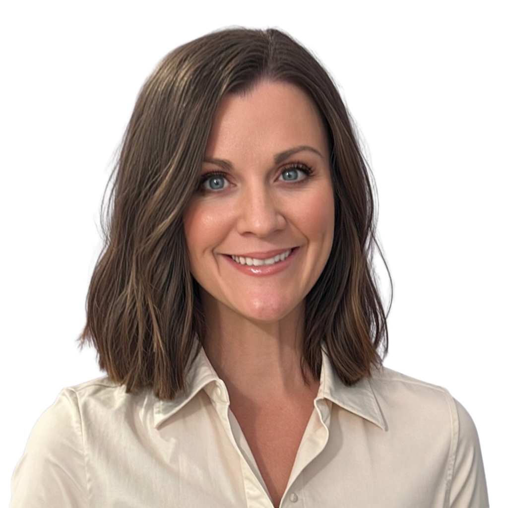 Close-up of a smiling woman with shoulder-length brown hair, wearing a cream-colored collared shirt against a blurred dark background.