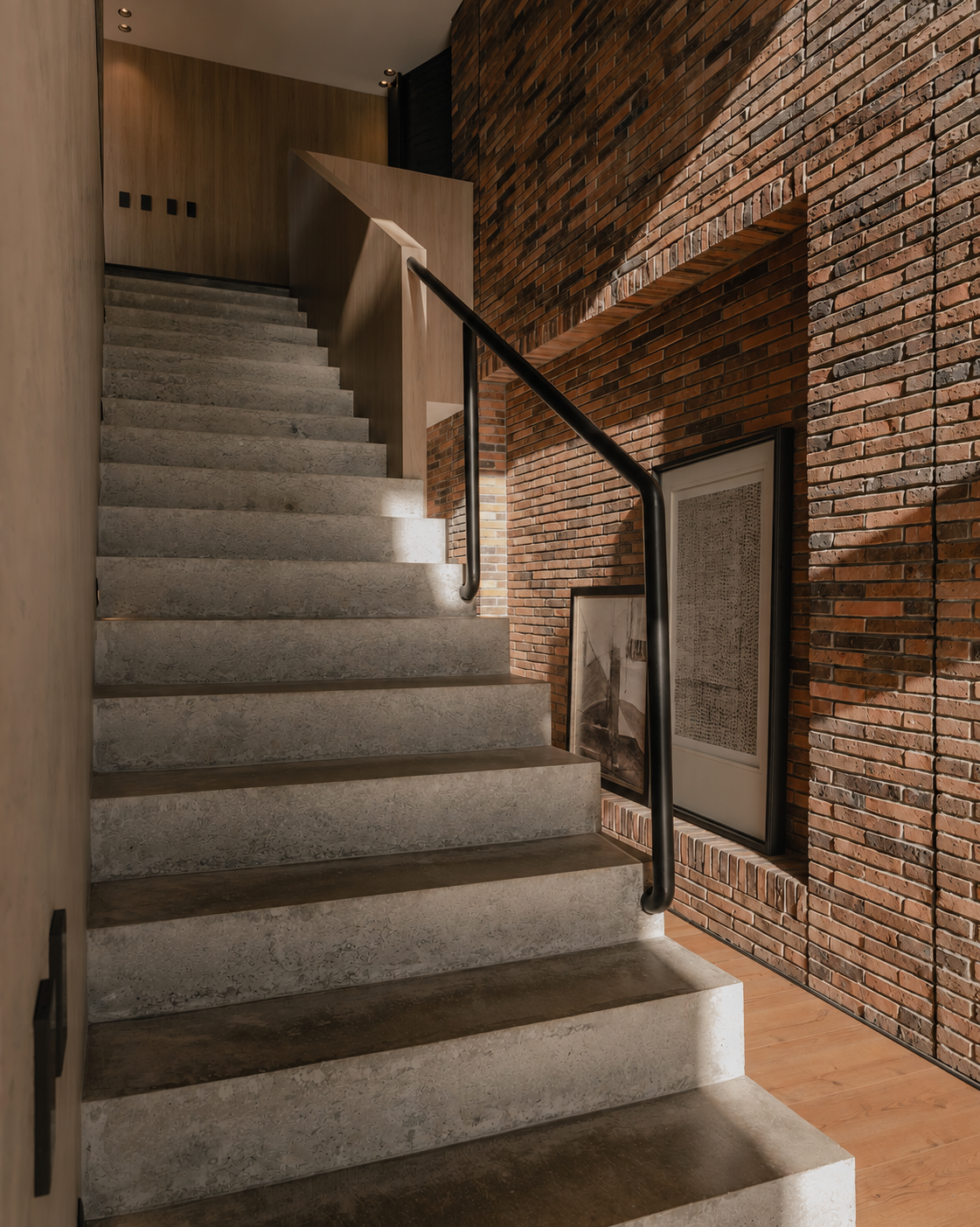 Warm Modern Stairwell with Framed Art.png