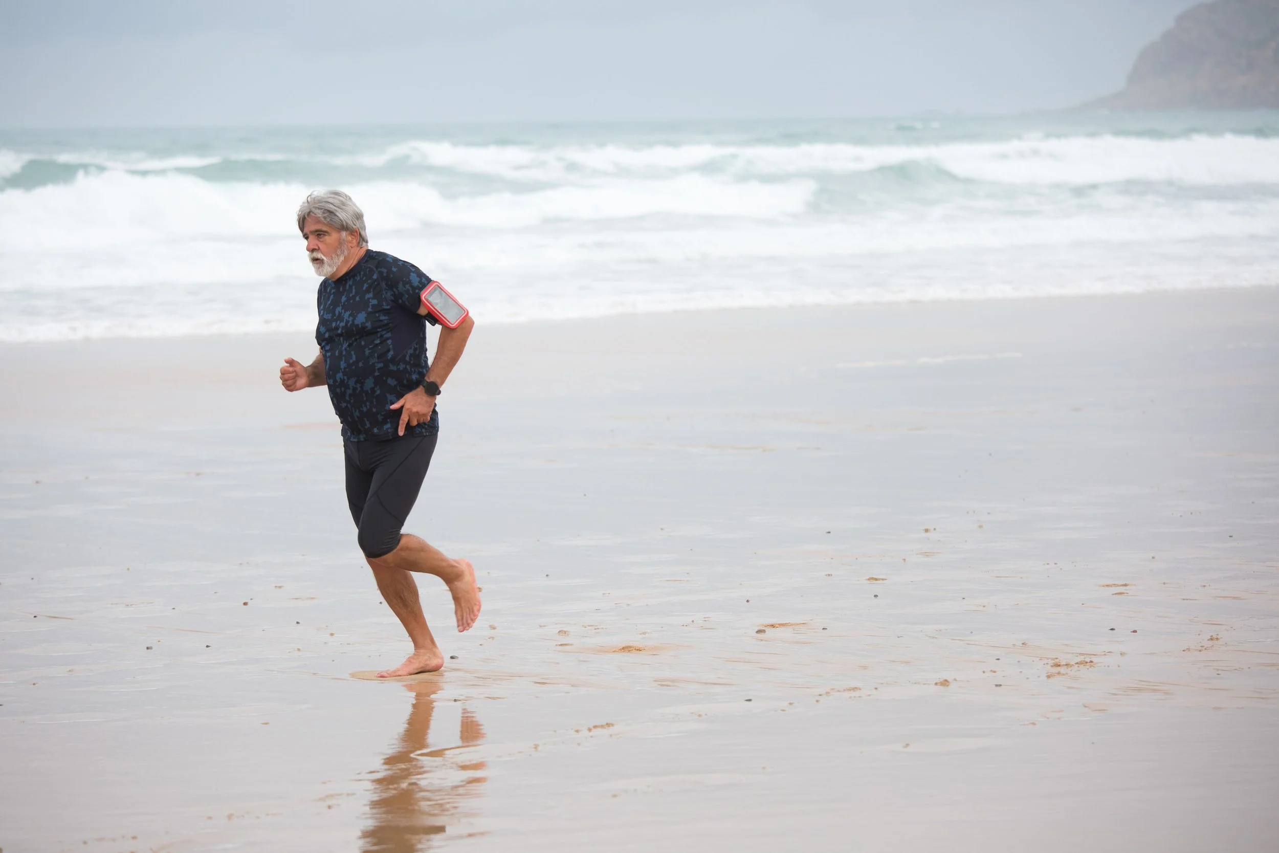 An older man running
