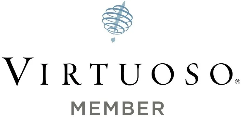 Virtuoso member logo with spinning globe icon above the text.