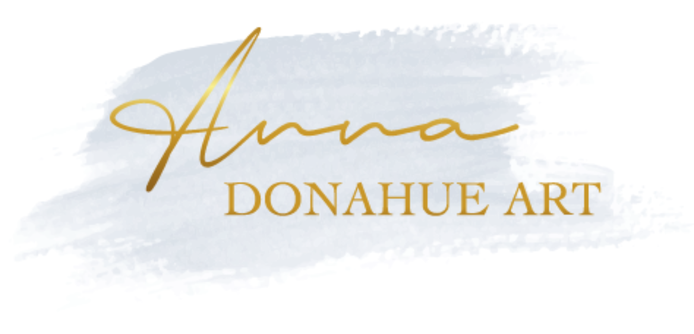 Logo for Anna Donahue Art with gold cursive name and gold text on a light gray brushstroke background.