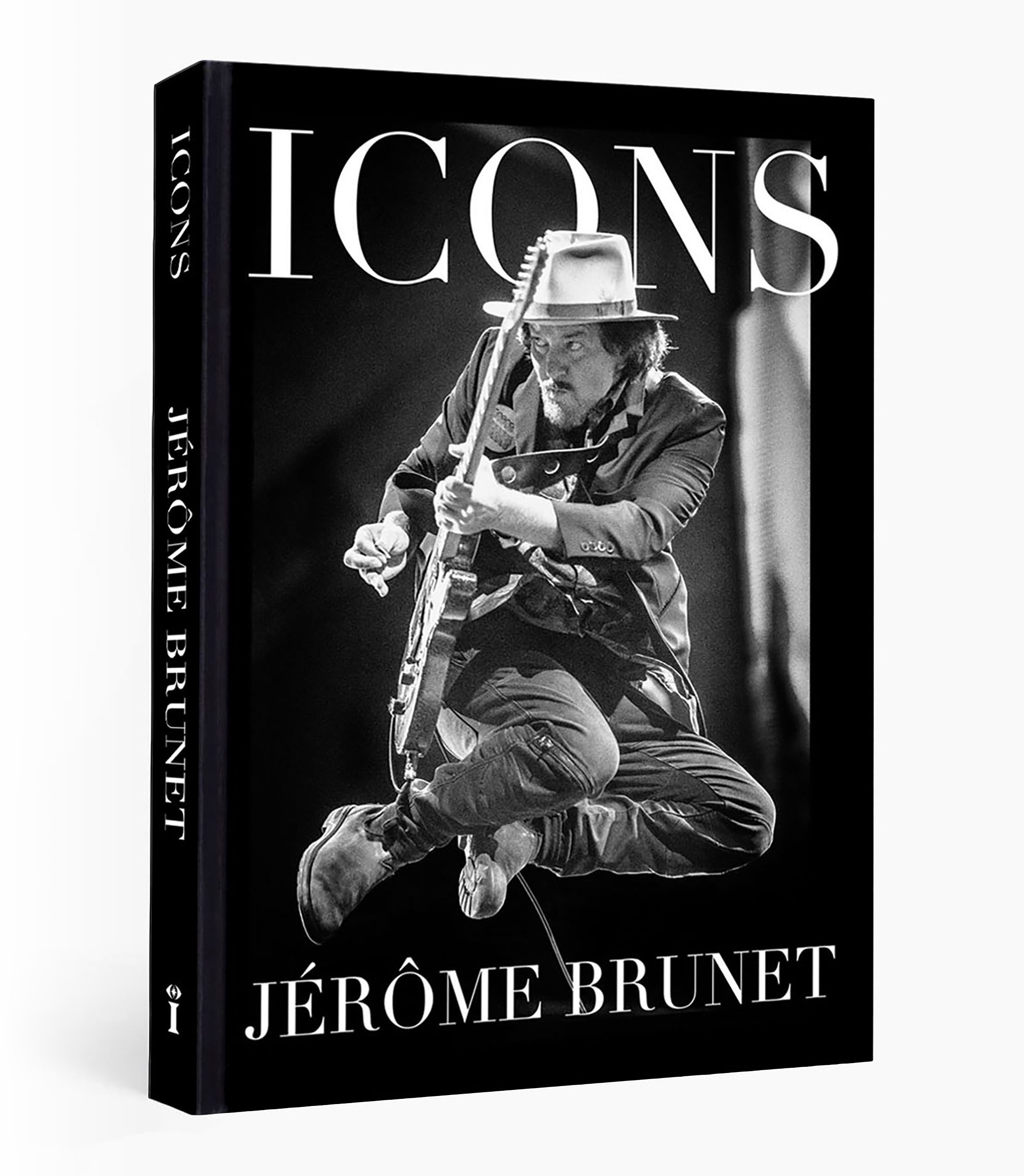Black and white photograph of Eddie Veder playing a guitar, with large text reading 'ICONS' and the author's name, Jérôme Brunet, on the cover of a book.