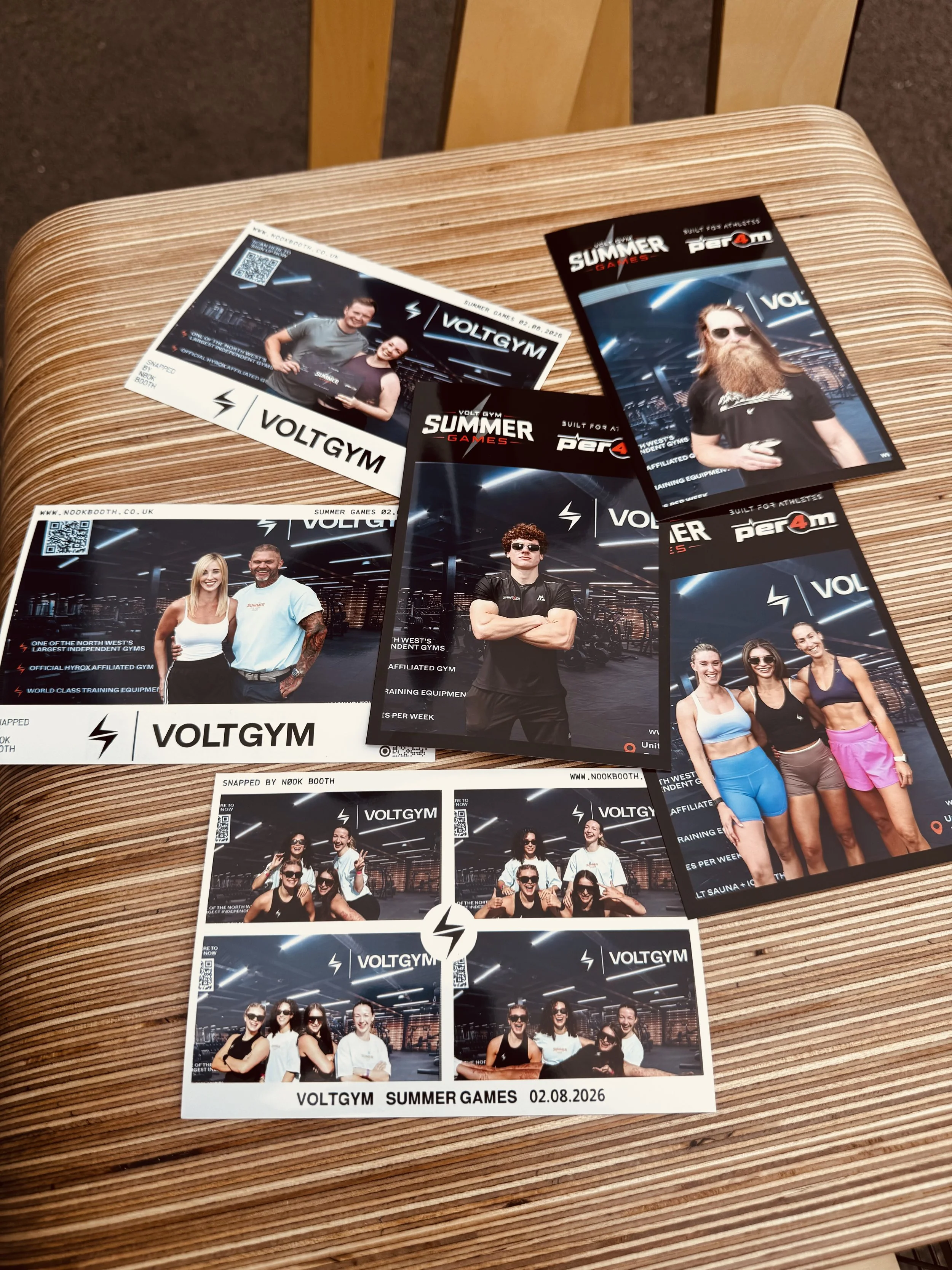 Collection of event photos and tickets from VoltGym Summer Games held on August 2, 2026, showing groups of people in gym environments, some wearing sunglasses, posing, and smiling. Taken by Nook booth Photo Booth. Taken by Nook booth Photo Booth.