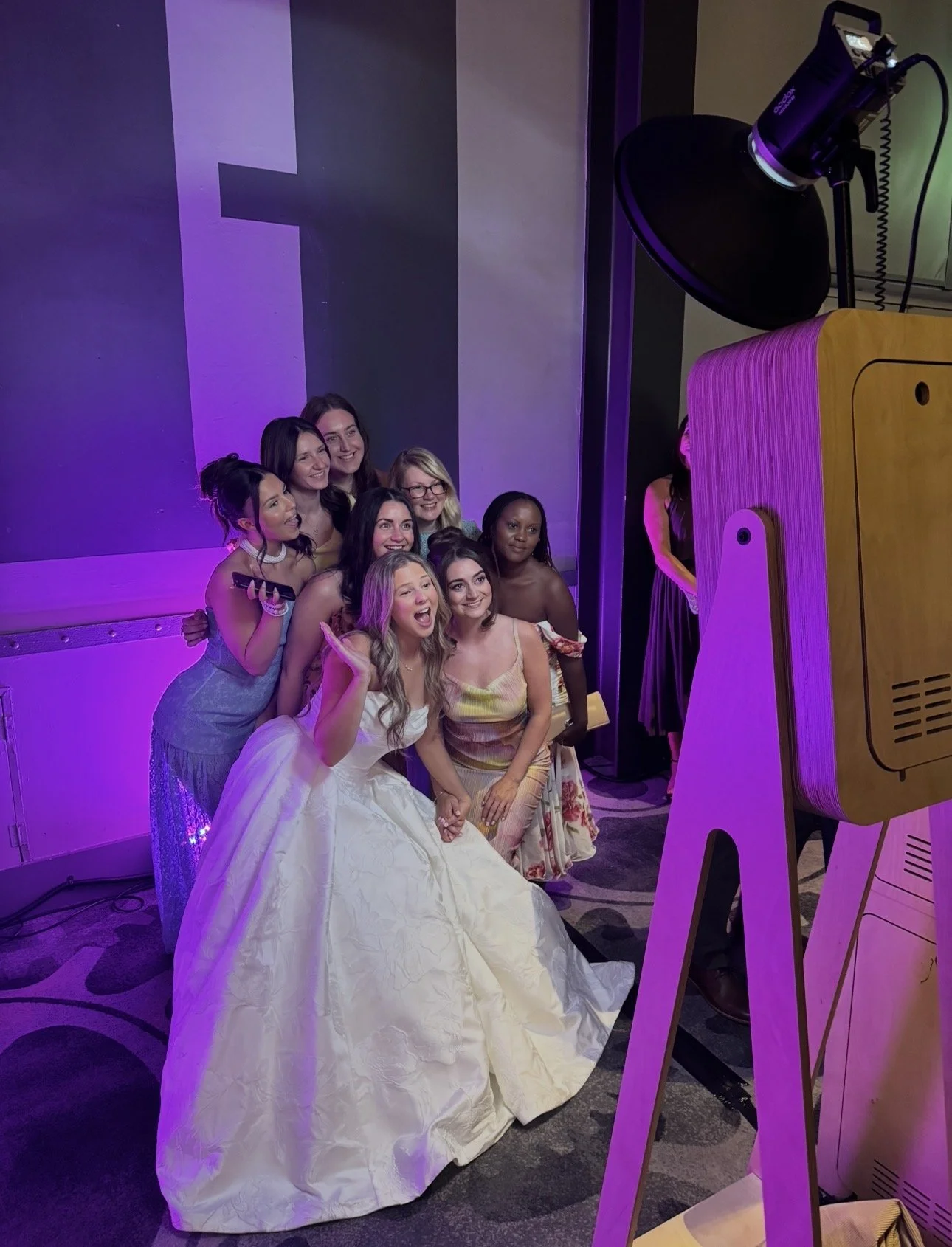 Group of women gathered for a photo at an event,titanic hotel Photo Booth hire