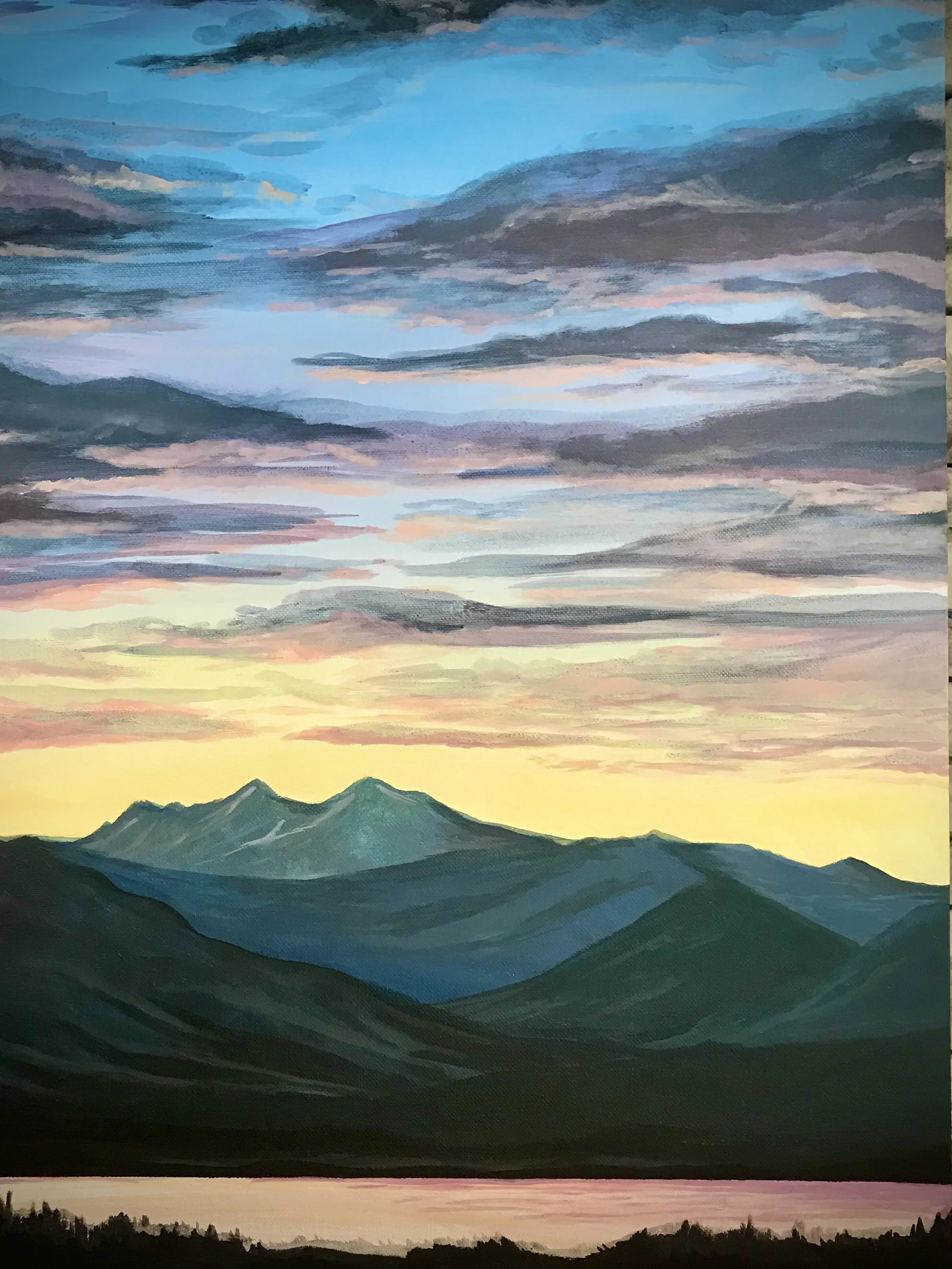 A landscape painting of a sunset over mountains with a colorful sky filled with clouds.