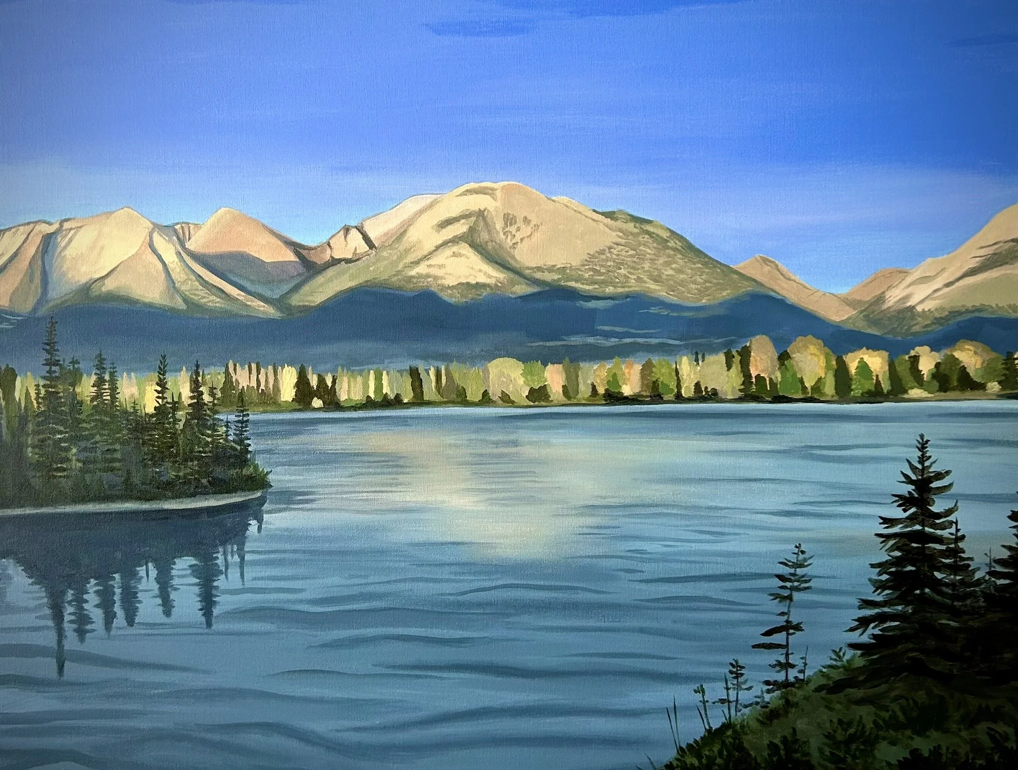 A watercolor painting of a mountain landscape with a lake, trees, and a clear blue sky.