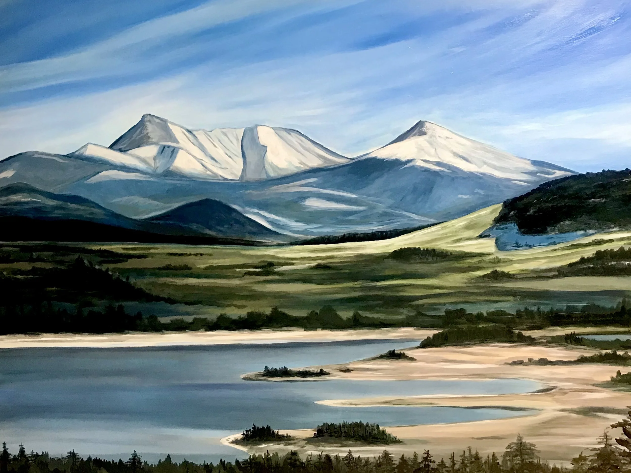 Painting of snow-capped mountains with green hills and a body of water in the foreground under a blue sky with wispy clouds.
