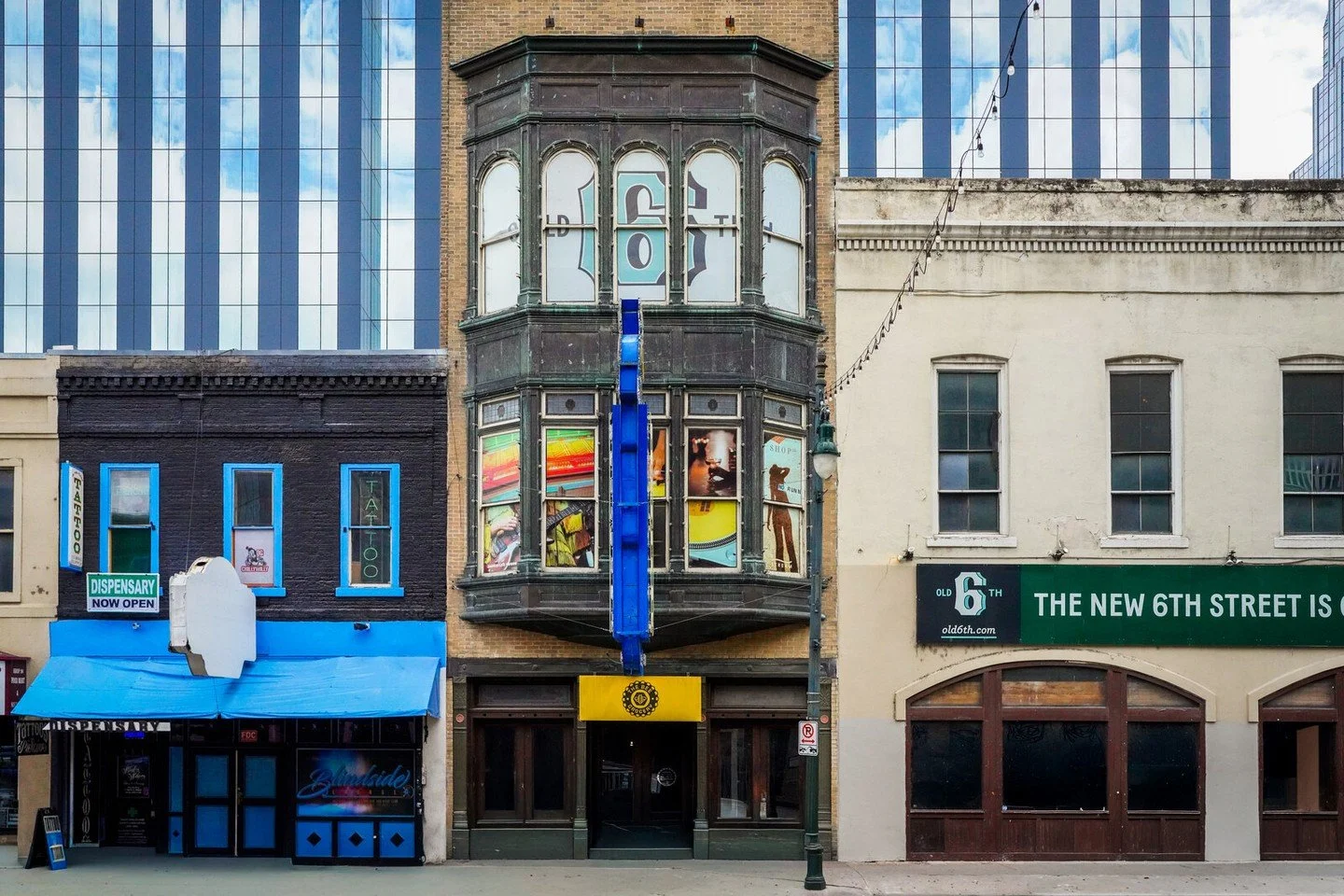 One of the more unique buildings on Old 6th is located at 209 E. 6th. Originally built in 1874, the Morley Brothers (S.K. and W.J.) Drug Store occupied the building from 1906 to 1935, at which time Grove Drug Store became the occupants until the earl