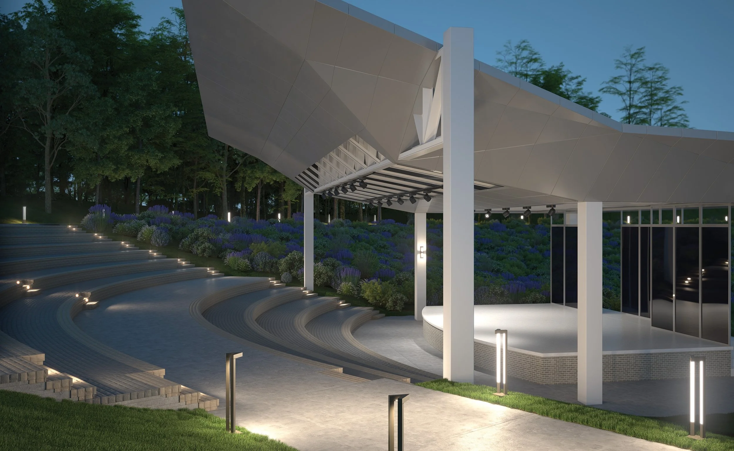 Modern outdoor amphitheater with curved illuminated seating, landscaped gardens, and a contemporary pavilion at dusk