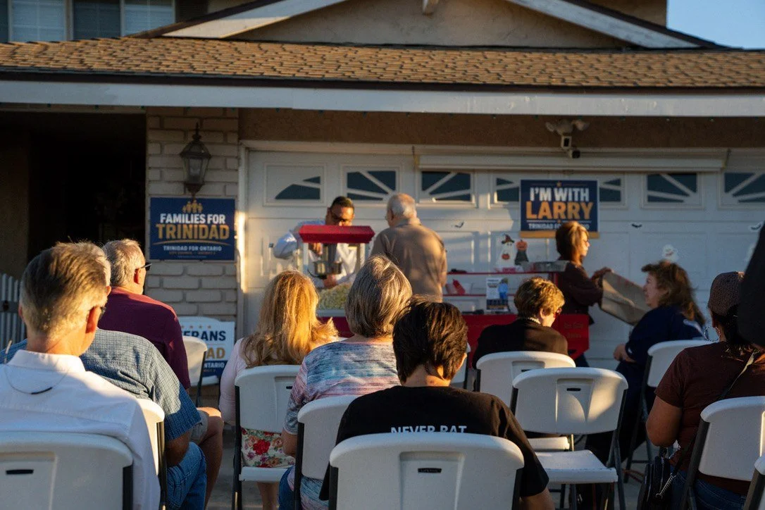 Neighbors gathered in a District 3 driveway for a Trinidad for Ontario meet and greet