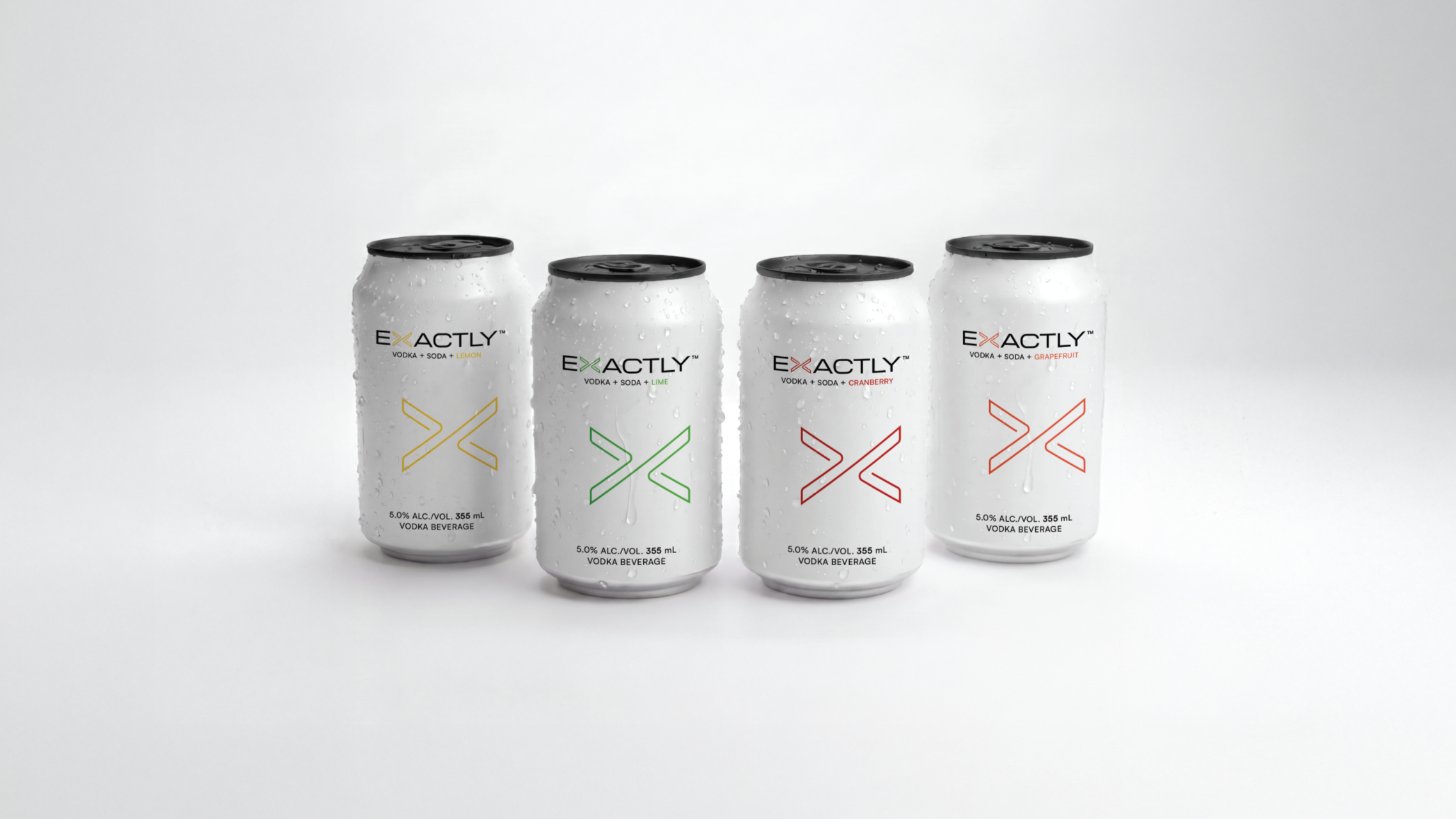 Exactly Vodka Soda lemon can and six-pack carton, showing the white packaging with the gold Connected Form X mark, designed by Pheiffer.
