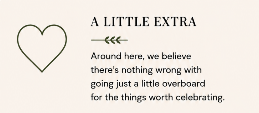 Decorative card with a green heart and the text 'A little extra' encouraging celebrating the good things in life.