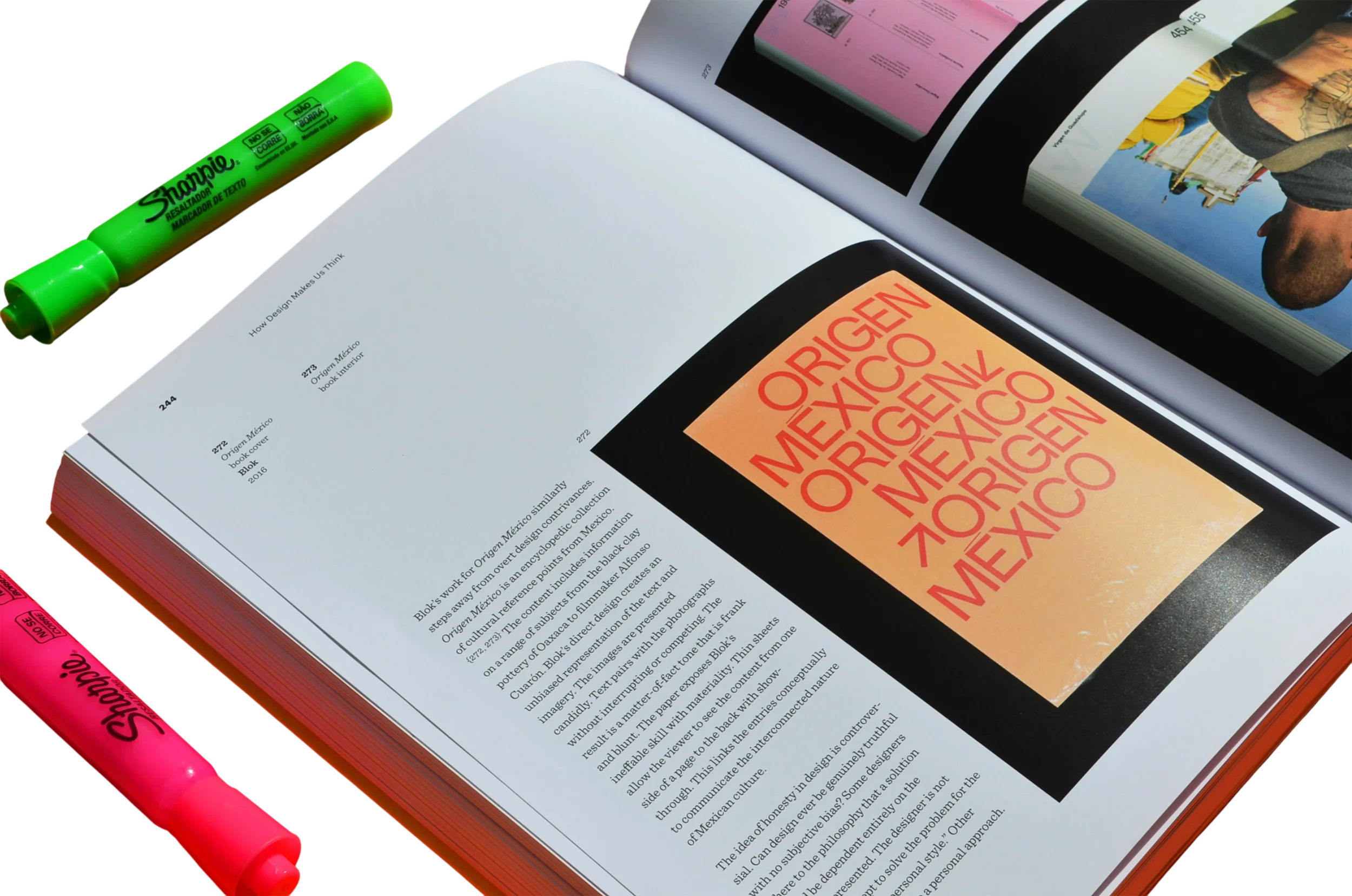 Open magazine pages showing text and colorful graphics, accompanied by a green highlighter and a pink highlighter on a desk.