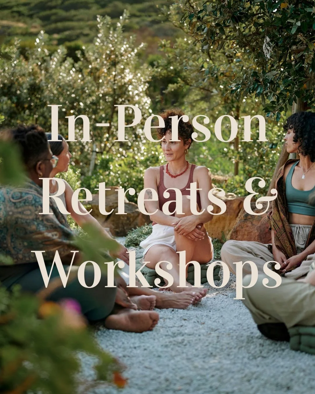a business coach for healers and wellness practitioners leads a group discussion on a retreat.