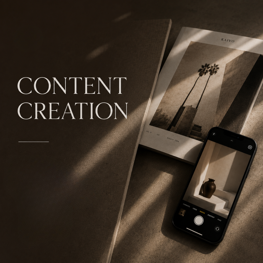 A book titled 'Content Creation' with a shadow cast over it, an open magazine featuring a photograph of palm trees, and a smartphone displaying a picture of a vase on a pedestal.