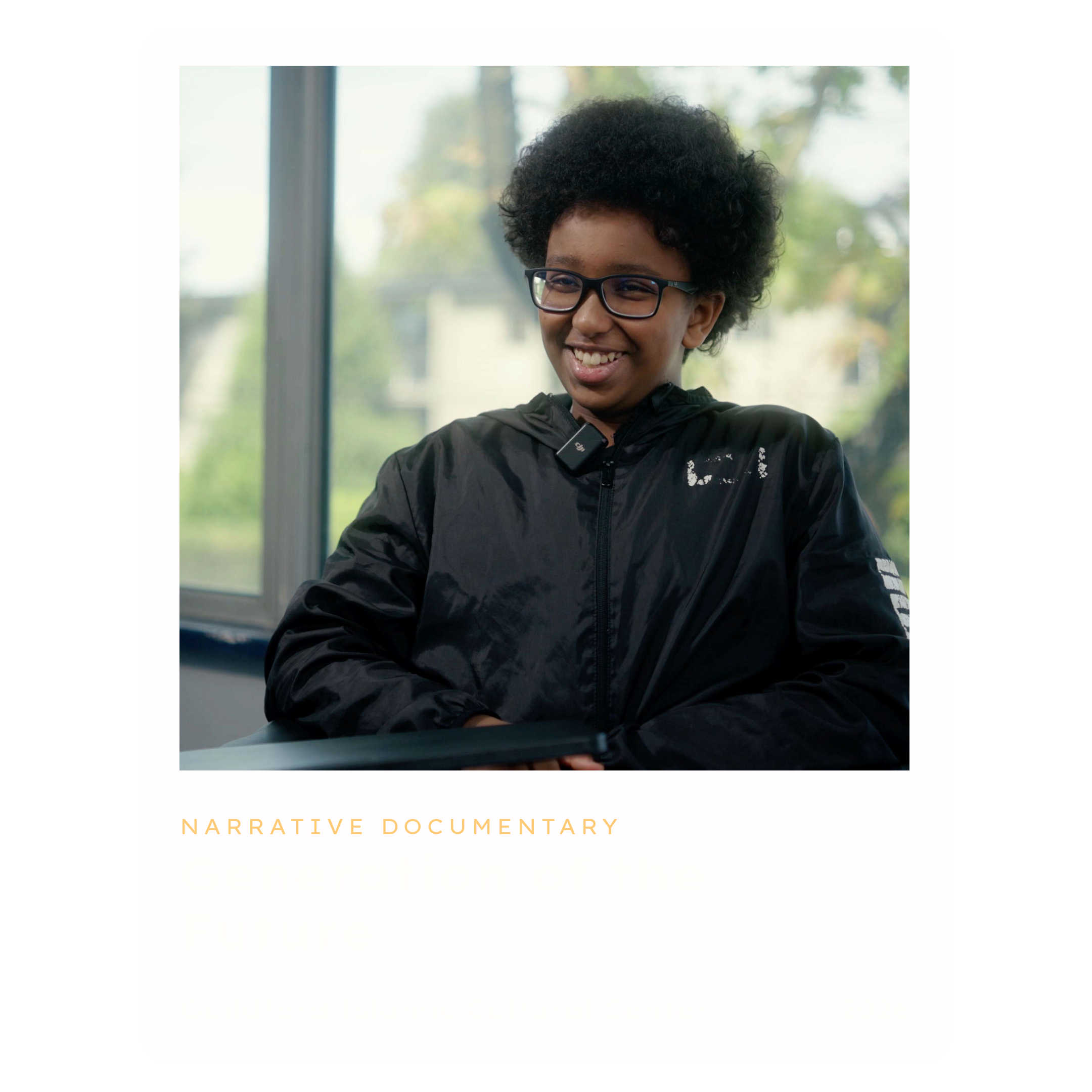 A person with glasses smiling and wearing a black jacket, sitting indoors near a window with blurred greenery outside, on a documentary cover titled 'Generation of the Future' at Guildford Islamic Cultural Center, 2026.