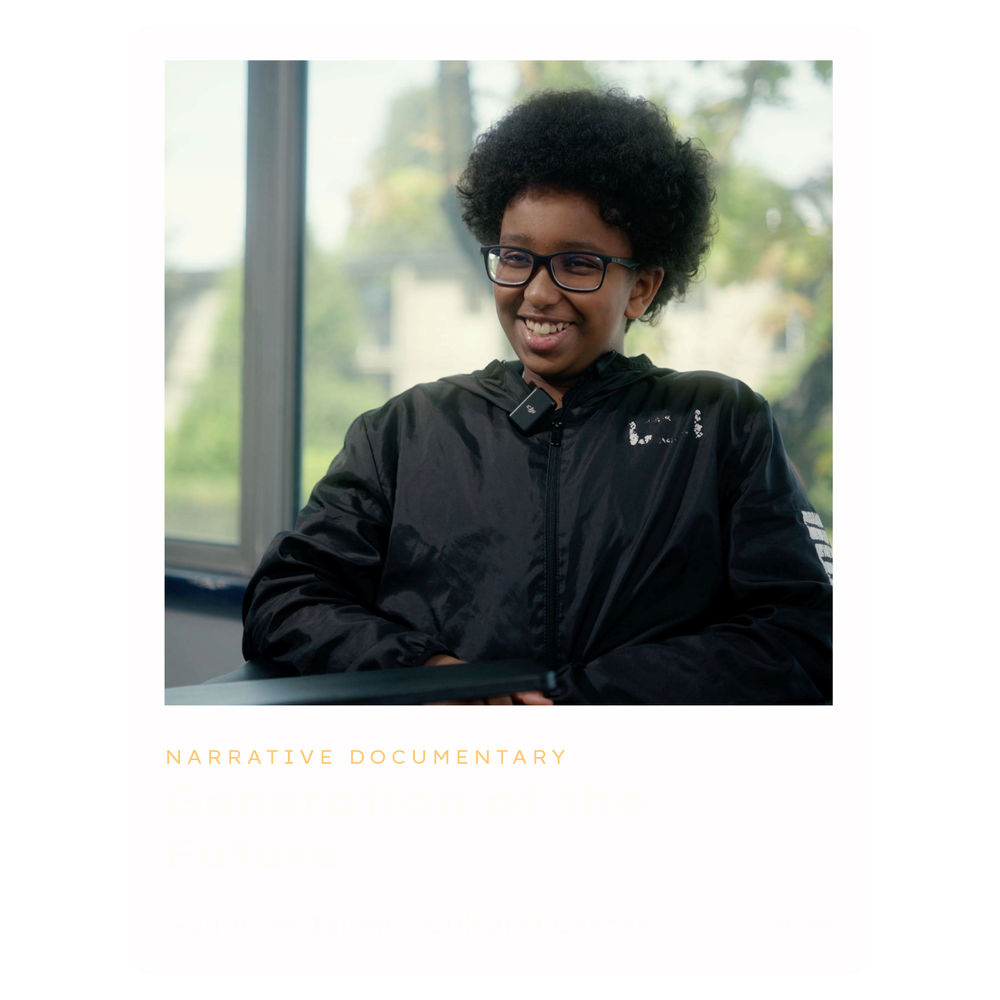 A smiling student in glasses, from the documentary Generation of the Future.