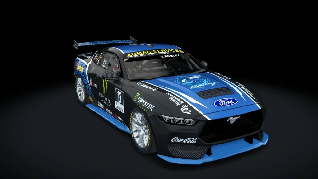 A Ford racing car in blue and black with various sponsor logos, including Monster and Coca-Cola, on a black background.