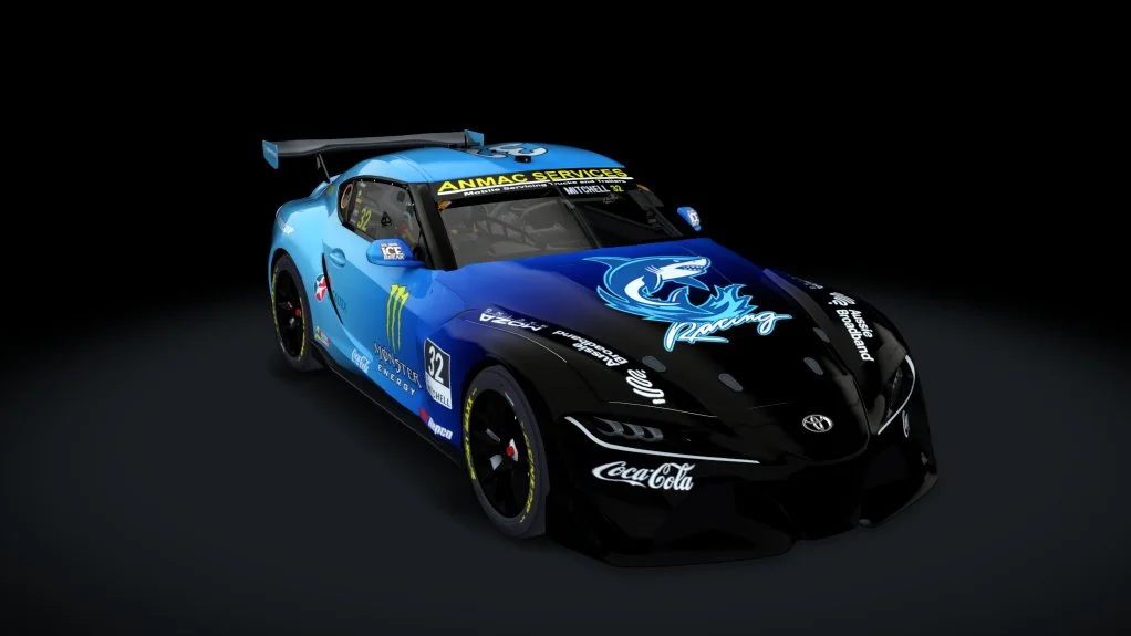 A race car with a blue and black color scheme, racing decals, and a large rear wing, displayed against a black background.