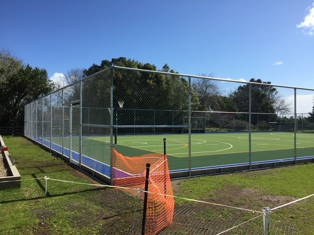 A tennis court fence