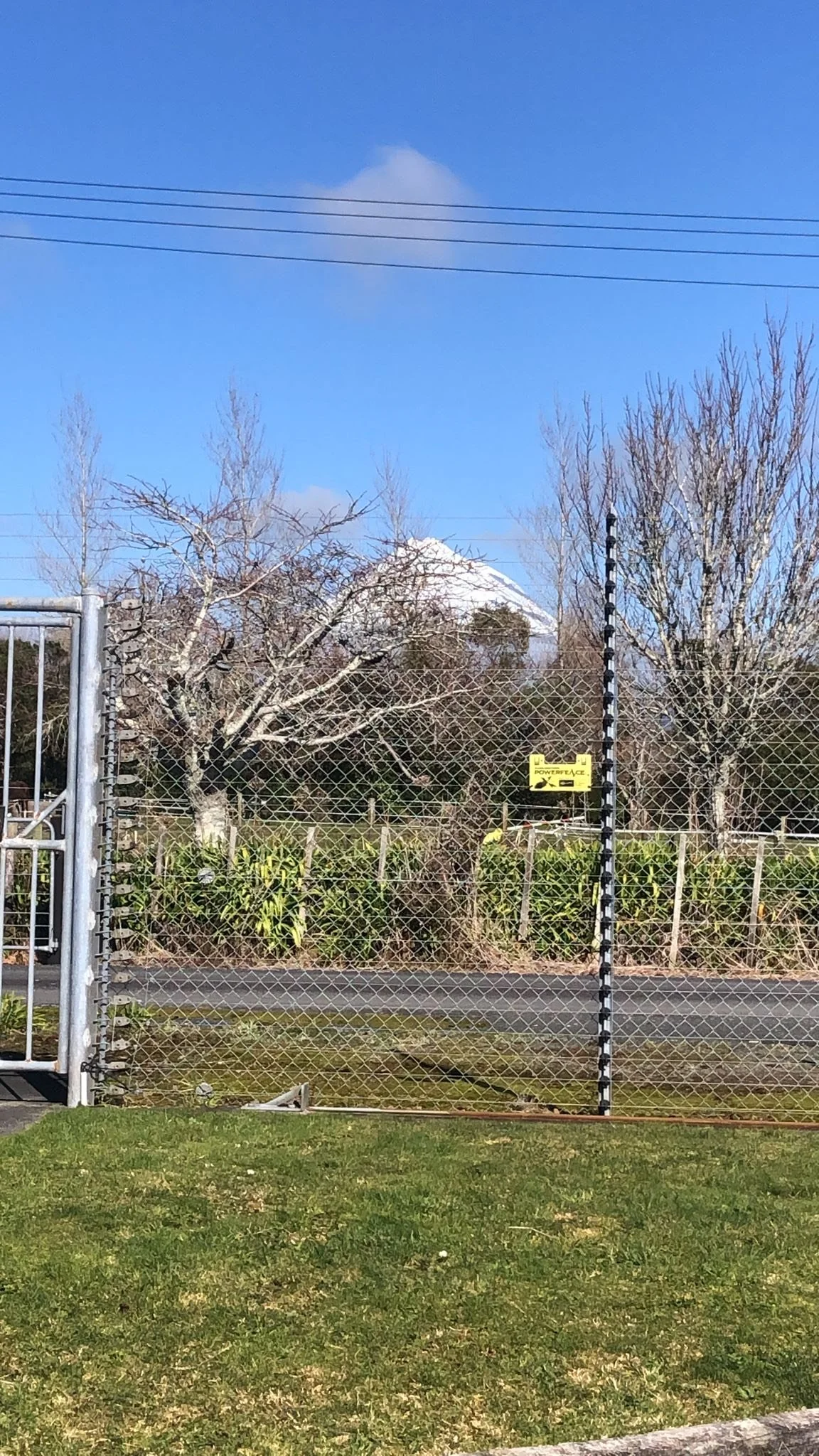 security fence with mountain behind