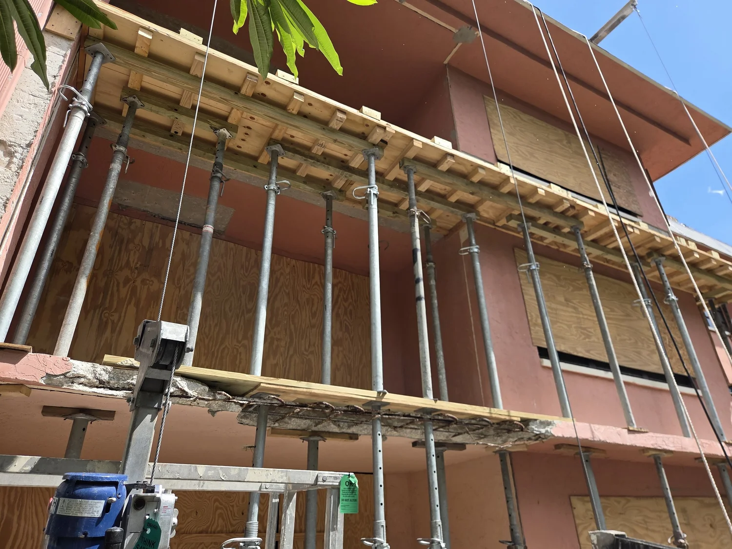 Scaffolding and shoring during structural concrete restoration work