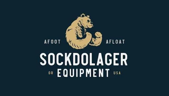 Logo with a bear illustration and the text "Sockdolager or Equipment USA" in bold and smaller fonts.