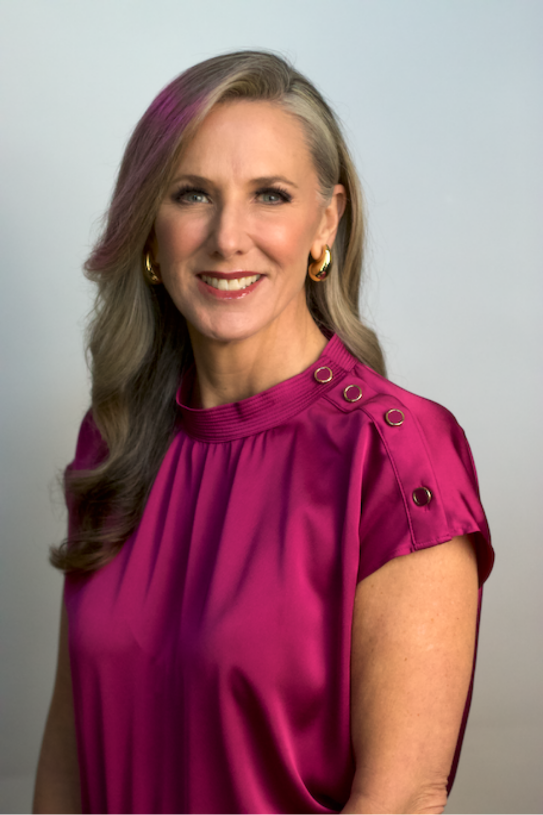 Heather Hodges smiling in a professional headshot.
