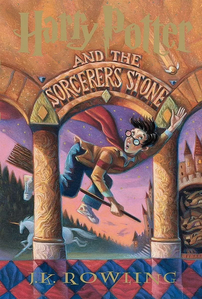 Book cover for 'Harry Potter and the Sorcerer's Stone' by J.K. Rowling, featuring Harry Potter flying on a broomstick.