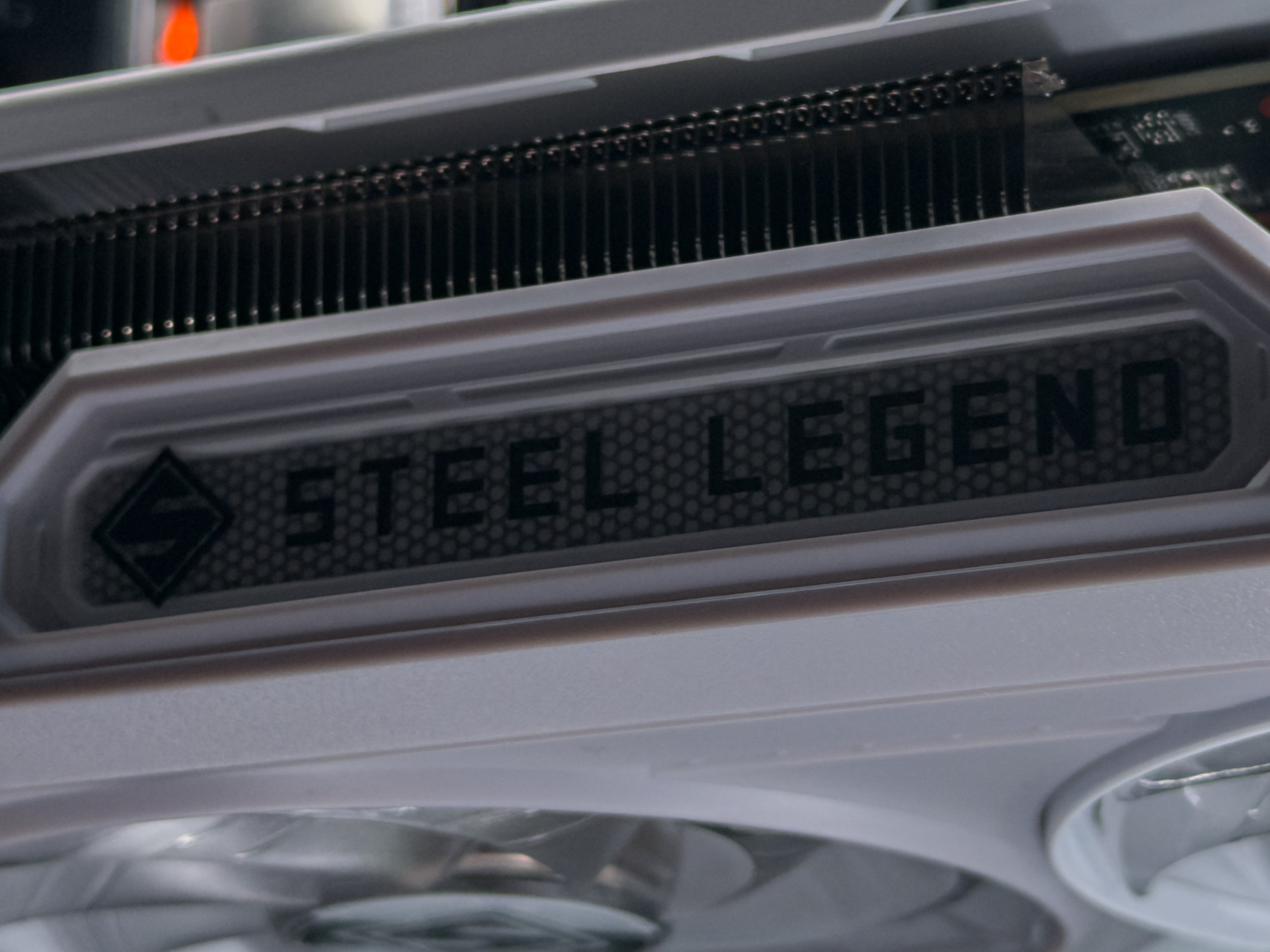 Close-up of multiple credit cards layered together, showing the word 'TELEGEN' on one of them.
