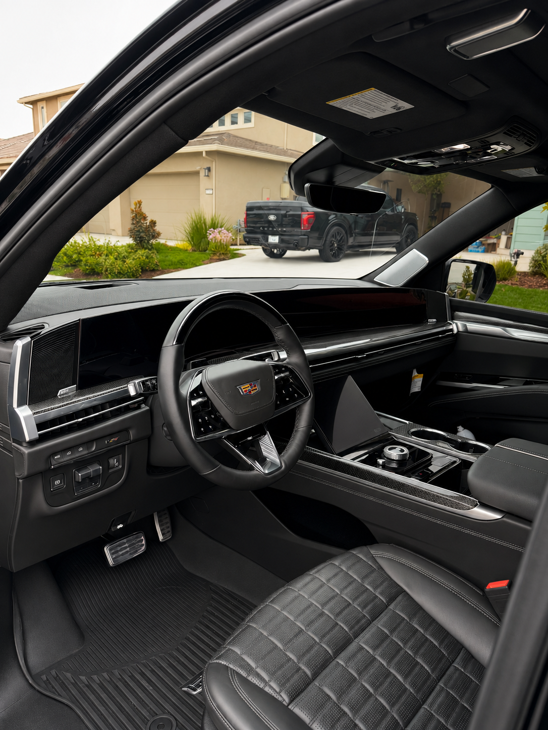 Detailed Cadillac interior — dashboard and leather seats cleaned by J's Mobile Detailing, Roseville, CA.